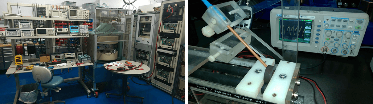 Electronics lab with equipment and oscilloscope display.